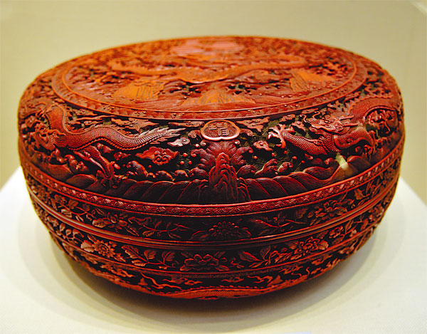 A lunchbox from the Qing Dynasty (1644-1911) with flying dragons. Photos Provided to China Daily A lunchbox from the Qing Dynasty (1644-1911) with flying dragons. Photos Provided to China Daily
